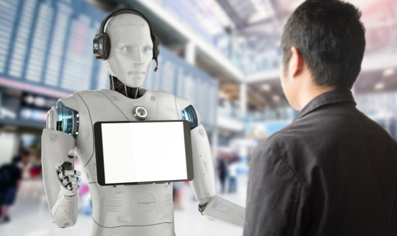 A person talking with a robot. Futuristic technology or machine learning concepts.