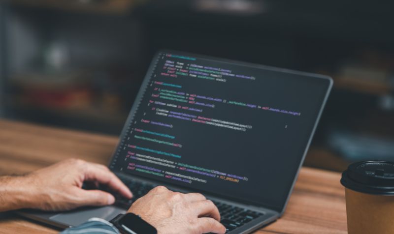 Python coding on laptop screen